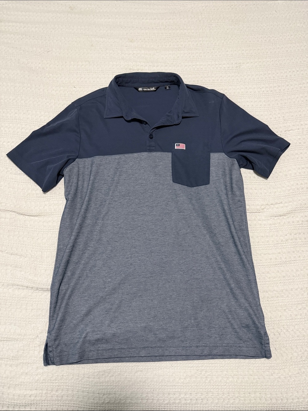 Travis Mathew Two-Tone Navy and Heathered Blue Polo